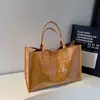 Bolsa de Mão Casual Feminina Estilosa e Relaxada, Estilo Novo para o Início da Primavera de 2026, Tote Bag Grande, Tendência, Simples e Personalizada