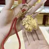 Llavero colgante con contenido de oro para gastar dinero llavero de papel de oro charm para cadena de teléfono evento de Año Nuevo del Año de la Oveja