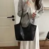 Nuevo diseño de nicho estilo coreano, versátil para el trabajo, cuero suave, retro, gran capacidad, bolso para madre e hijo, bolso de mano para mujer, se puede llevar en la mano o colgar al hombro