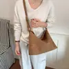 Bolso tote tejido texturizado para mujer, nuevo modelo 2026, bolso de hombro de nicho de lujo ligero de alta gama, bolso de mano simple y elegante para el día a día