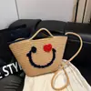 Bolsa de Rosto Sorridente Fofa Tecida à Mão para Mulheres 2026 Nova Bolsa Saco de Grande Capacidade para o Dia a Dia Bolsa de Palha para Férias na Praia