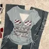 Camiseta Vintage Retro Americana Falsa Duas Peças Color Blocking com Cordão Manga Curta para Mulheres, Top Verão 2025