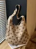 Yaozi 2026 colección de principios de otoño: bolso de hombro de gran capacidad, versátil y moderno, con colores contrastantes, que irradia una sensación de alta gama, y un bolso cruzado versátil