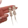 Pendientes de Borla de Concha de Flor Plateada de Hada Súper para Mujer, Pendientes de Estilo de Resort de Playa de Gama Alta, Pendientes Hermosos y Elegantes