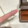 Anillo doble de niña estilo coreano con flores y pedrería, nuevo diseño geométrico hueco entrelazado, anillo abierto versátil y único