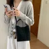 Bolso de Cubo de Mano de Gama Alta para Viajes Diarios Otoño 2026 Nuevo Bolso Retro de Hombro Único para Madre e Hijo Bolso Cruzado de Gama Alta para Mujer