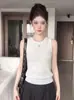 Camisola sin mangas de color liso con cuello redondo y corte ajustado estilo 'hot girl' americana para mujer, prenda exterior de verano 2026, top interior elegante