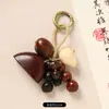 Nuevo colgante de bolsa de cuentas de semillas que cumple deseos estilo chino, llavero de Bodhi natural tejido a mano, decoración artística retro para bolsa