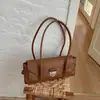 Bolso de axila de alta gama transfronterizo para mujer, nuevo modelo de moda versátil retro para el otoño de 2026, bolso de mano de lujo ligero