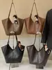 Bolso de hombro grande de moda coreana simple y elegante para mujer, capacidad grande, nuevo para Otoño 2026, para el trabajo diario.