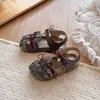 Sandalias Infantiles 2026 Verano Nuevas para Niñas con Lazo Huecas Zapatos de Princesa Niña Pequeña Tejidas Suela Suave Sandalias Romanas