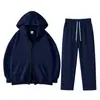 Conjunto de sudadera unisex negra con capucha y cierre, que incluye una sudadera holgada abierta por delante y pantalones de chándal de pierna recta con cordones, un conjunto de dos piezas