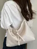 Bolso de Mujer 2026 Verano Nuevo Estilo Casual Marrón Tejido Pequeño Bolso Cruzado Cuero Suave Simple Versátil Bolso de Mano Vintage