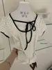 Wgwe8810 Guangzhou Shisanxing Moda Feminina Verão Novo Camiseta de Manga Curta com Bolinhas e Top com Amarração na Cintura Franzida