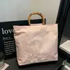 Nuevo bolso de mano de lino con nudo de bambú transfronterizo, bolso de mano para mujer estilo chino otoño 2026, bolso de mano de noche para dama
