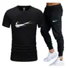 Traje casual de color liso para hombre de verano transfronterizo 2024 Camiseta de algodón de cuello redondo + Pantalones Moda Dos piezas
