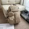 2026 Novo Estilo Simples Cor Sólida Mochila de Lazer para Viagem ao Ar Livre Mochila de Grande Capacidade para Ensino Fundamental Mochila Multifuncional