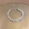 Pulsera redonda con incrustaciones de diamantes transfronteriza europea y americana, lujo ligero, alta gama, moderna, simple, única, nicho, joyería versátil para mujer