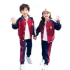 Novedad primavera y verano 2023 uniforme escolar infantil CUHK uniforme de clase jardín de infantes grado 123 uniforme de jardín uniforme deportivo conjunto rojo de dos piezas