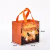 Bolsas de tela no tejida personalizadas para comercio exterior, bolsas grandes y coloridas para empaque de regalos de Halloween, bolsas de regalo de calabaza para el Festival de los Fantasmas