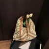 Bolsa de Paja Tejida Nueva de Verano 2026 Bolso Tote Grande de Hombro Bolso de Playa para Vacaciones en la Costa Bolso Versátil para Mujer