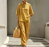 2026 Conjunto de Duas Peças Moda Feminina Casual Europeia e Americana Amazon com Listras, Manga Curta, Bolsos e Calça Pantalona