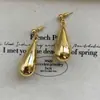 Pendientes Exagerados Grandes de Gota de Agua para Mujer Otoño e Invierno Lujo Accesible Francés Diseño de Nicho Pendientes Largos Versátiles de Alta Gama Pendientes de Botón
