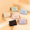 Billetera Pequeña Estilo Coreano Dopamina con Lazo para Mujer Modelo Nuevo 2026 70% de descuento Ranura para Múltiples Tarjetas Portamonedas y Tarjetas Cartera Transfronteriza