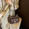 Bolsa de Ombro Acolchoada com Diamantes de Alta Qualidade para Uso Diário Feminino Nova Tendência Outono 2026 Bolsa de Corrente Fashionable Bolsa de Ombro Único Transversal Texturizada