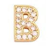 K62 Accesorios populares europeos y americanos letra latón circón chapado en oro de 18 quilates colgante pequeño collar colgante