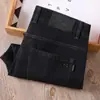 Estação europeia verão fino preto azul banho de gelo lama amigável à pele respirável macio anti-rugas negócios reto solto jeans masculino