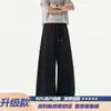 Calça de moletom masculina cor de aveia com corte diagonal, caimento ajustado, marca moderna estilo americano, calça esportiva larga solta de peso pesado para o outono
