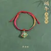 Pulseira de corda colorida zongzi do Festival do Barco-Dragão 2026 novo modelo pulseira trançada artesanal étnica infantil atacado corda vermelha
