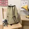 Bolso cubo con cordón de tela de nailon estilo coreano nuevo para mujer, mochila de viaje versátil, mochila escolar de gran capacidad para estudiantes, moda