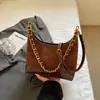 Bolsa feminina de ombro com corrente 2026 nova moda tendência retrô personalizada bolsa de ombro para trabalho e deslocamento bolsa transversal