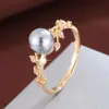 Anillo de Venta Caliente Transfronterizo Ramas y Hojas de Vid Exquisitas Europeas y Americanas con Perlas Rosas Encuentro Diamante Incrustado Arte Venta Directa de Fábrica