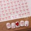 Venta al por mayor de pegatinas explosivas para uñas con lazo, cinta sencilla, color blanco y negro, vino tinto, huecas, con pegatinas adhesivas para decoración de uñas.