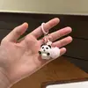 Encantador llavero de panda de resina 3D, animal de dibujos animados con lazo, dulce y adorable, perfecto como regalo para estudiantes o mejores amigos para colgar en sus mochilas