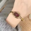 Reloj Vintage Dorado Ovalado para Mujer, Venta al por Mayor desde Fabricante, Exportación Tk Sudeste Asiático Pulsera de Bañera Reloj Más Vendido