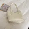 Bolso tote serie marrón para mujer, bolso de hombro de gran capacidad, diseño nicho coreano, bolso de mano ligero
