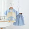Nuevo traje de verano para niños con solapa, linda camisa de dibujos animados de manga corta y pantalones cortos, conjunto versátil casual de dos piezas