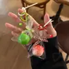 Um pingente de maçã, decoração de bolsa de frutas simulada, chaveiro de paz e alegria da véspera de Natal, presente de Natal para meninas
