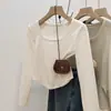 Al por mayor transfronterizo otoño e invierno terciopelo alemán interior cálido ajustado cuello redondo manga larga camiseta mujer ajustada hombro clavícula camiseta básica