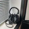 Bolso pequeño plisado de moda para mujer, nuevo bolso tipo cubo simple con cordón de lunares franceses, bolso cruzado popular de verano para el día a día