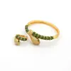 Conjunto de Pulsera y Anillo de Serpiente Cascabel con Goteo de Aceite Chapado en Cobre Oro de 18 Quilates Incrustado con Circonita Nuevo Ingreso de Lujo de Nicho Transfronterizo Europeo y Americano
