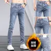 Inverno 2023 novo jeans grosso forrado com fleece moda masculina marca calças baggy moda calças versáteis