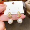Pendientes de Flor Geométrica de Imitación Perla y Circonita Estilo Vintage de Aguja Plateada Lujo Ligero Personalidad de Moda Nicho Elegantes de Gama Alta para Mujeres