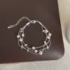 Pulsera Multicapa de Perlas Estrelladas de Lujo para Mujer, Moderna y Sofisticada, Diseño Único, Joyería Elegante y Exquisita