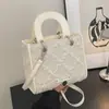 Bolsa Saco Plissada Rombos Retro Simples de Luxo High-End Transfronteiriça Feminina Nova Primavera 2026 Bolsa de Mão