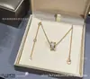 Collar de resorte pequeño Baojia versión de alta gama en oro V, versión de alta gama CNC, modelo de caridad para celebridades, cadena para clavícula chapada en oro de 18k con cerámica